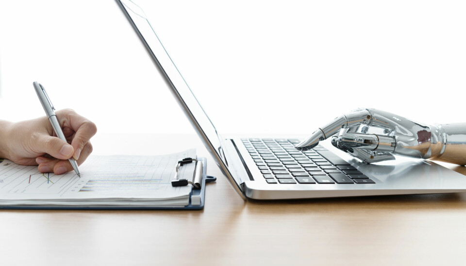 Robot hand using laptop and man hand writing. kunstig intelligens chatbot chatgpt