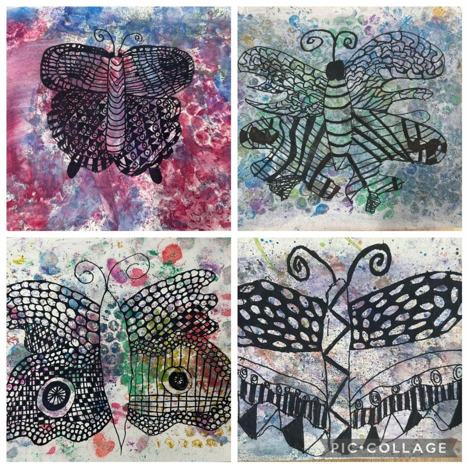 2. klasse på Mårslet Skole har skabt tusch-sommerfugle på akvarelbaggrund.
